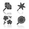 Wild flowers drop shadow black glyph icons set. Common star lily, blue flax, helianthus, blanket flower. Blooming