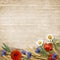 Wild flowers with spikelets on a wooden background