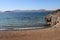 Wild gravel beach of Bitez peninsula hiking trail on Bodrum coast in Turkey.