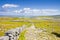 Wild Irish landscape with stone trail to the ocean Aran Island