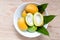 Wild mango on wooden background