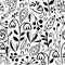 Wild meadow flowers seamless vector pattern background. Black and white dense millefleur repeat with hand drawn florals