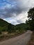 Wild panorama from mountains in Abruzzo, Italy. Cloudy sky and dry rivers
