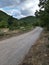 Wild panorama from mountains in Abruzzo, Italy. Cloudy sky and dry roads