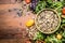 Wild rice with kale and vegetables ingredients for healthy cooking on rustic wooden background