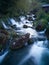 Wild river Krupa with big rocks and cascades and small traditional wooden mill on popular tourist place Krupa na Vrbasu near Banja