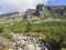 Wild river stream on Footpath trail from Strbske Pleso, beautiful nature with pine trees and rocky montain peak, High Tatras mount