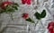 Wild Roses Cut Flowers Aesthetic. Old Country Cotton Blanket. Bed of Roses. Rustic Floral Art Floristry in Antique Farmhouse.