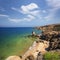 Wild seashore with fancy weathered cliffs