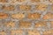 Wild stone shell rock wall texture. Decoration of external walls with bricks from wild stone shell rock. Uneven surface of shell