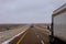 Wild truck driving on snowy dirt road on New Mexico, USA