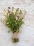 Wild viola flowers bouquet tied with jute rope