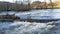 Wild water rapids in english rural landscape