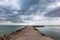 Wild weather and storm clouds above the Robe breakwater located in South Australia on November 11th 2020