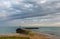 Wild weather and storm clouds above the Robe breakwater located in South Australia on November 11th 2020