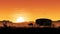 Wild West Adventure: Covered Wagon and Horse Silhouettes at Sunset