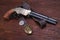 Wild West weapon - Volcanic Repeating Pistol with US Army belt with buckle and silver dollar