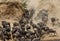 Wildebeests rushing through the trench of  Mara river