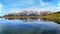 Wilder Kaiser mountain ridge with reflection on the Astbergsee lake