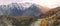 Wilderness trekking path in Passu surrounded by snow capped mountains in Karakoram range