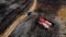 Wildfire aftermath - Firefighter engine and police car - aerial shot