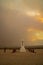 Wildfire smoke near the Manzanar National Historical Monument memorial statue