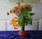 Wildflowers Bouquet in Small Red Glass Vase & Yellow Daylilies & Greenery