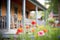 wildflowers in foreground with log cabin porch behind