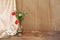 Wildflowers, red poppies in an old brass jug on an old wooden table, white silk drapery, the concept of the Dutch still life