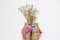 Wildflowers vase handmade decoration isolated on white background.