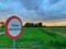Wildlife, private land sign, private road, green fields in the countryside, sunset in the fields, clouds at sunset