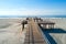 WILDWOOD, NEW JERSEY, USA - June 25, 2017: Crest beach and wooden dock from above with the ocean view and tourists relaxing