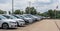 Wilkins Township, Pennsylvania, USA July 18, 2021 Brand new Nissan automobiles together in a parking lot at a dealership