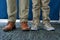 He will fill out Daddys shoes one day. Cropped shot of an unrecognizable man and his son standing side by side.