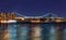 Williamsburg bridge by night, spanning the East River between Brooklyn and Manhattan