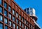 The Williamsburg Hotel has a rust colored facade and and a water-tower bar offering New York skyline views