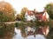 willy lotts cottage at flatford mill in suffolk in autumn reflections in lake