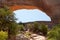 Wilson Arch, a natural sandstone arch located 24 miles south of Moab, Utah. Amazing view looking down into the valley