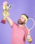 Win tennis game. Tennis match winner. Achieved top. Tennis player win championship. Athlete hold tennis racket and