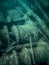 Winches with ropes overgrown with algae on a sunken ship