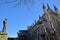 WINCHESTER, UK - FEBRUARY 4, 2017: Exterior view of the Cathedral with the statue of First World War Soldier on the left hand side