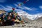 Wind blow clouds and colorful prayer flags in front of the north