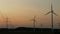 Wind energy farm at sunset