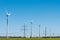 Wind energy plants and an overhead power line