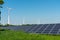 Wind engines and solar panels on a sunny day