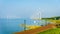 Wind Farm in the inland sea named IJselmeer seen from the historic fishing village of Urk