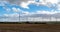 Wind farm park near Yelvertoft on bright cloudy day