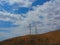 Wind farm, view of several wind trubines on mountainside in California.