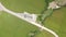 Wind generator on green agricultural field aerial view. Windmill station drone view. Renewable, sustainable, generation