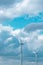 Wind generators on a cloudy sky background.natural energy source. Natural renewable clean energy.